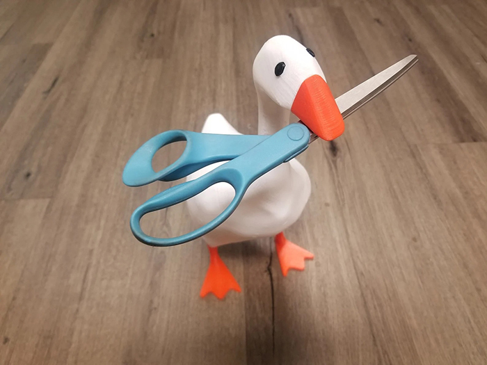 3d printed magnetic goose figurine with scissors in beak