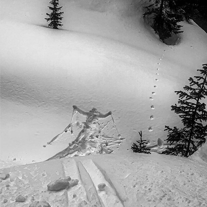 skier body print on snow