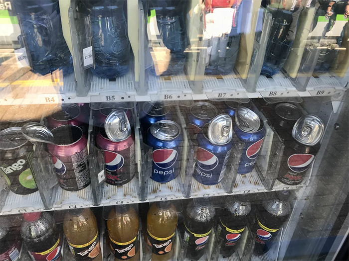 summer heatwaves canned soda exploding inside vending machines